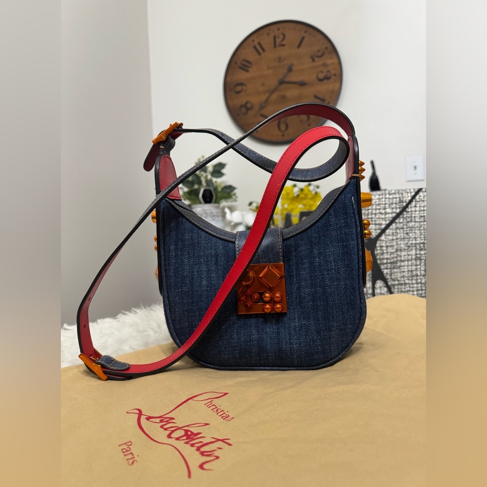 LIKE NEW CHRISTIAN LOUBOUTIN
Carasky denim mini bag NO CALL OUT